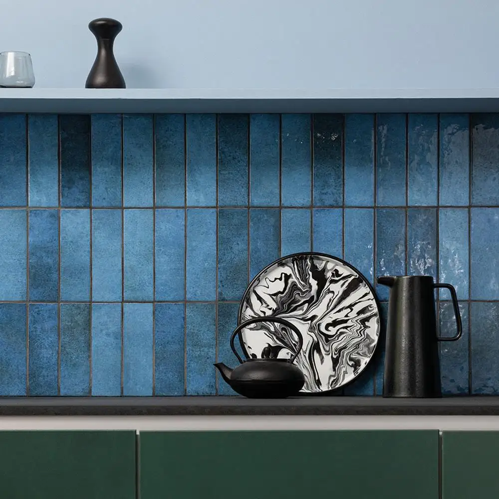 Black wall tiles green blue